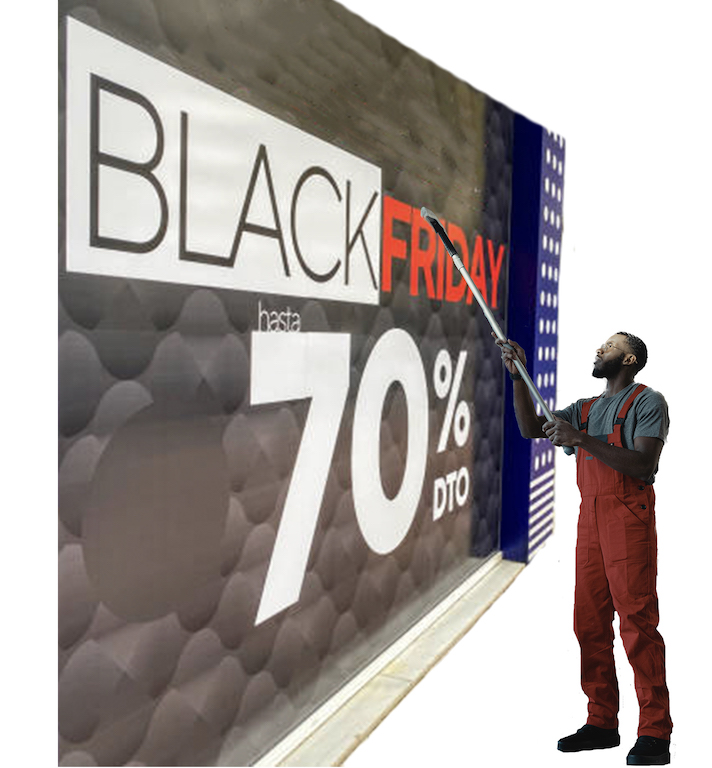 Pose d’adhésifs Pose d'adhésifs en vitrine